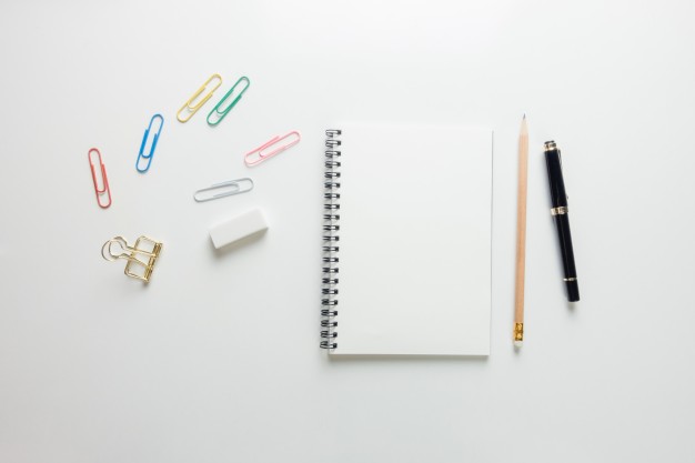minimal-work-space-creative-flat-lay-photo-of-workspace-desk-with-sketchbook-and-wooden-pencil-on-copy-space-white-background-top-view-flat-lay-photography_1253-991